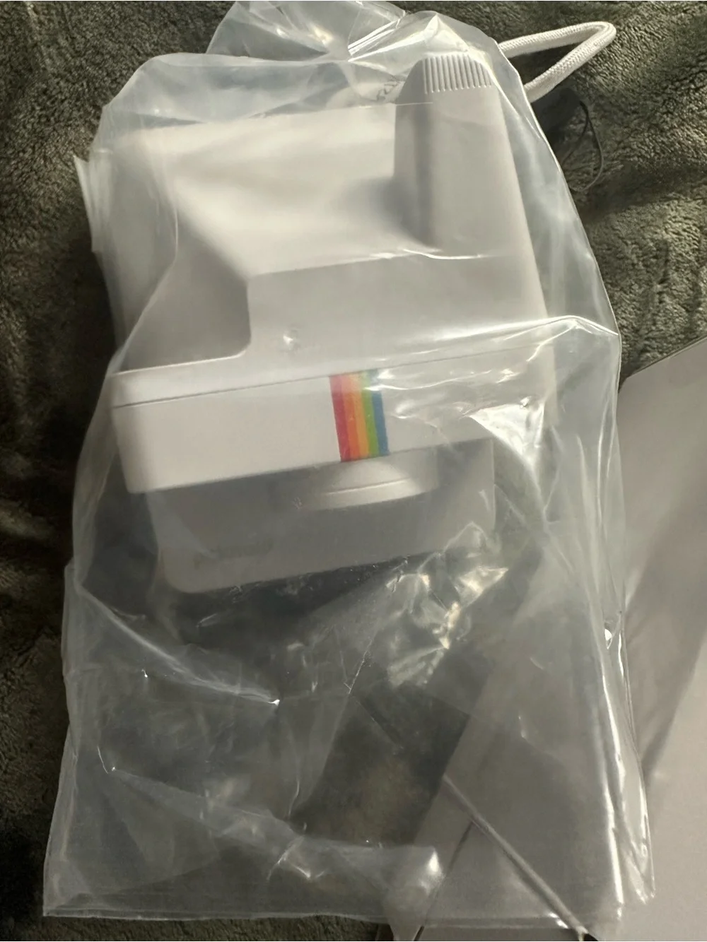 NEW IN BOX. Polaroid White Instant Camera with Rainbow Accent. NEVER USED.